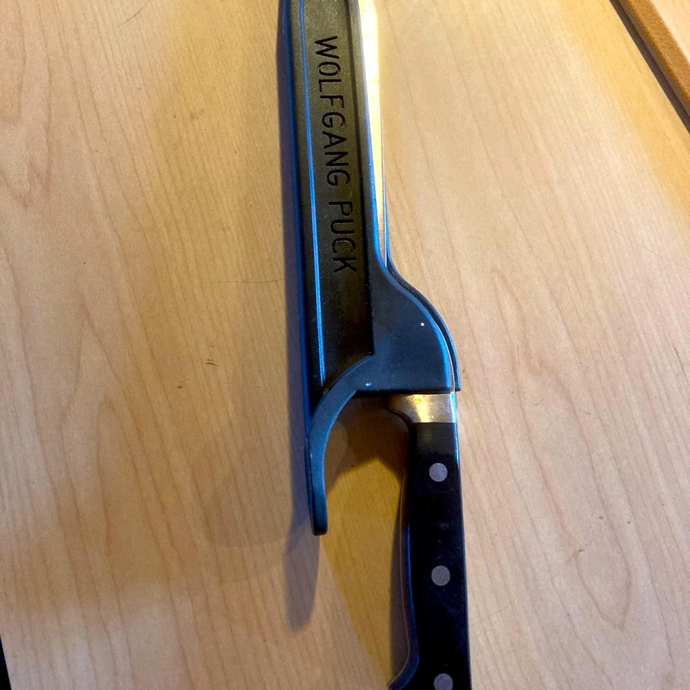 Wolfgang Puck Black and Silver bread Knife and cover 13 inch
